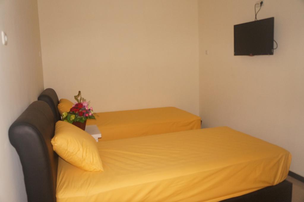 Budget Guest House Tunas Mandiri Jaya Malang Quarto foto